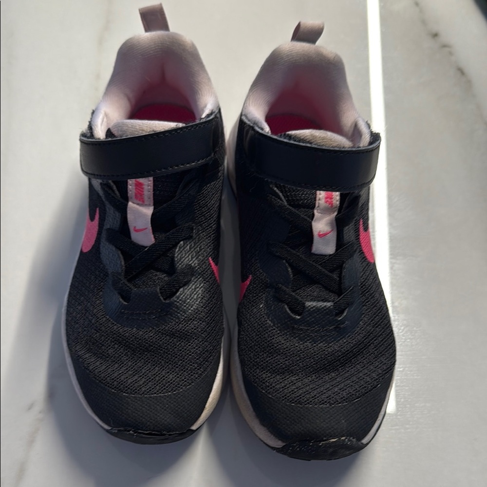 Nike Black and Pink Sneakers with Breathable Mesh and Cushioned Midsole